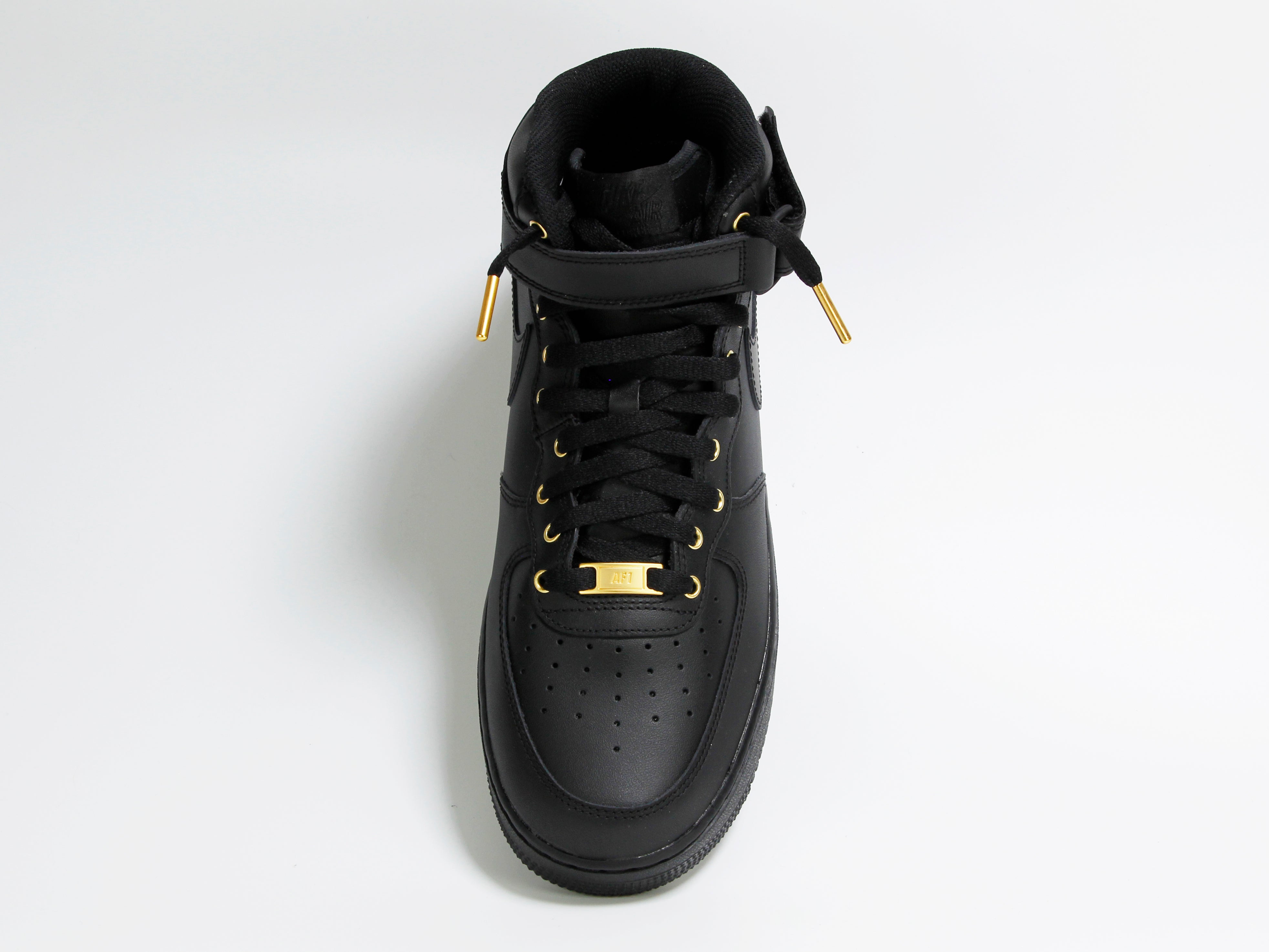 Nike air force 1 hotsell mid black and gold